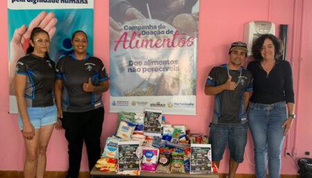 Irados Car Club entrega alimentos arrecadados em evento