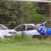 Jogadores e torcida em campos de futebol amador da cidade