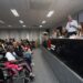 Evento realizado na sede da OAB de Campinas com participantes discutindo esporte