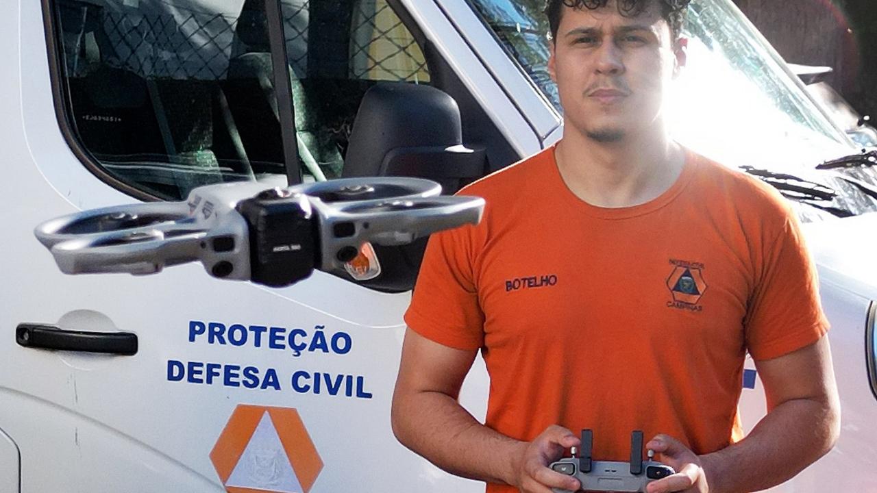Drone voando em espaços confinados com cão robô realizando inspeção terrestre em área de risco