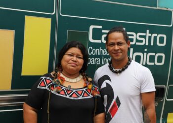 Indígenas em ação do Cadastro Único em Campinas durante seminário de diálogo entre universidade e comunidades migrantes
