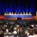 Auditório cheio durante o debate sobre modernização da Justiça na PUC Campinas